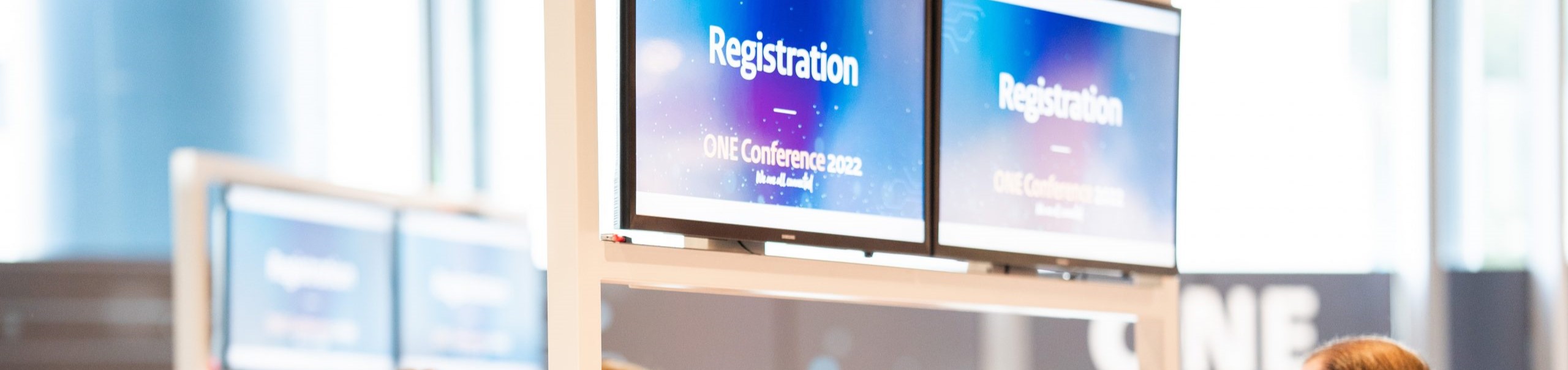 Registration screens at the ONE Conference